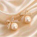 Luxury Pearl Bow Stud Earrings for Women | Gold Plated Crystal Ribbon Designer Earrings - Image 5